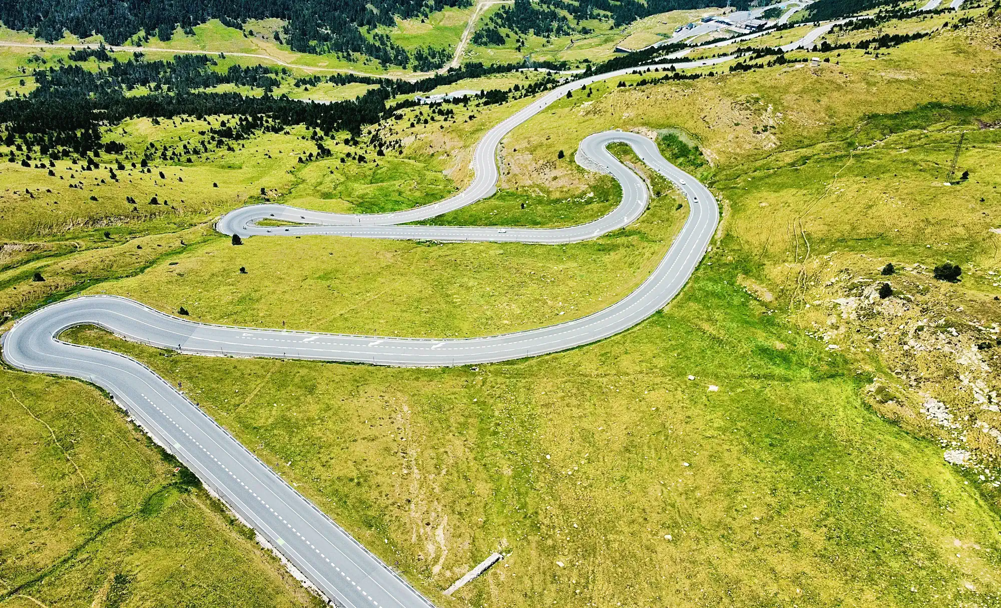 Scenic winding mountain road in the Pyrenees explored on private tours from Barcelona