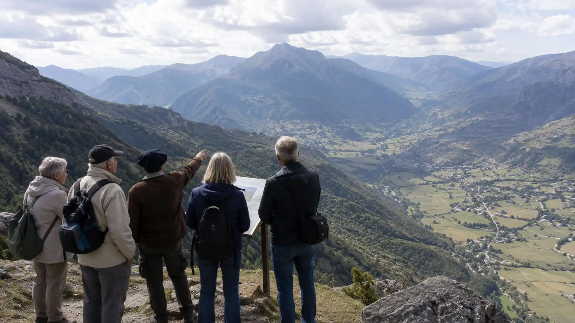 Travelers overlooking a Pyrenean valley connected with WWII escape routes